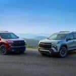 Two Family Friendly 2025 Chevy Traverse Parked Heroically Parked On The Edge Of A Cliff