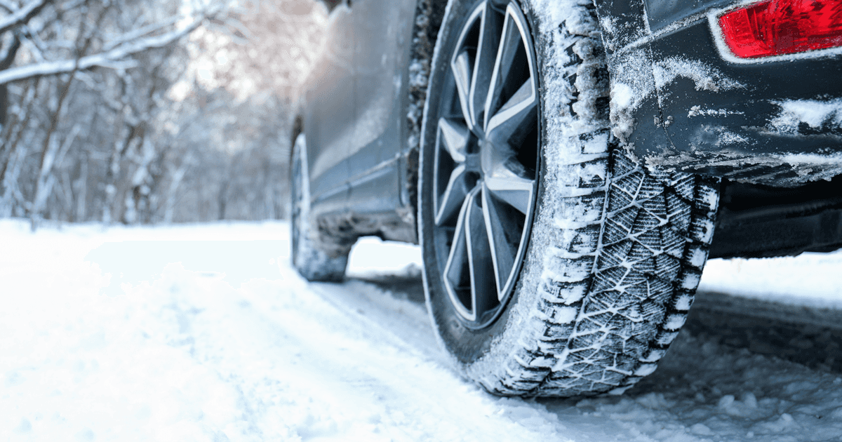 Car in snowy winter scene
