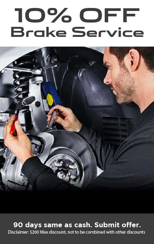 A service Technician stands above a car hood. Text reads 10% Off Brakes Service