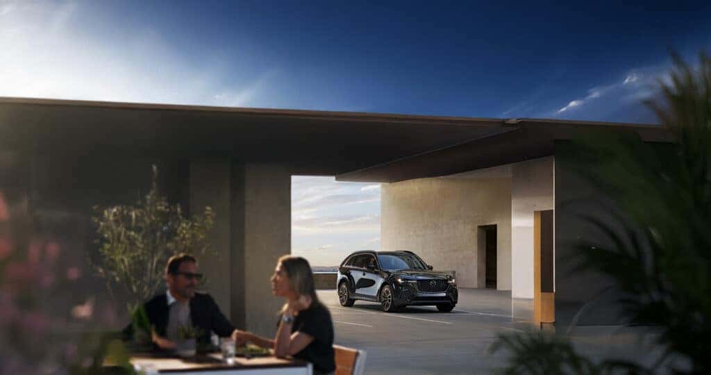 2025-Mazda-CX-70-parked-under-the-roof-of-an-open-air-modern-home