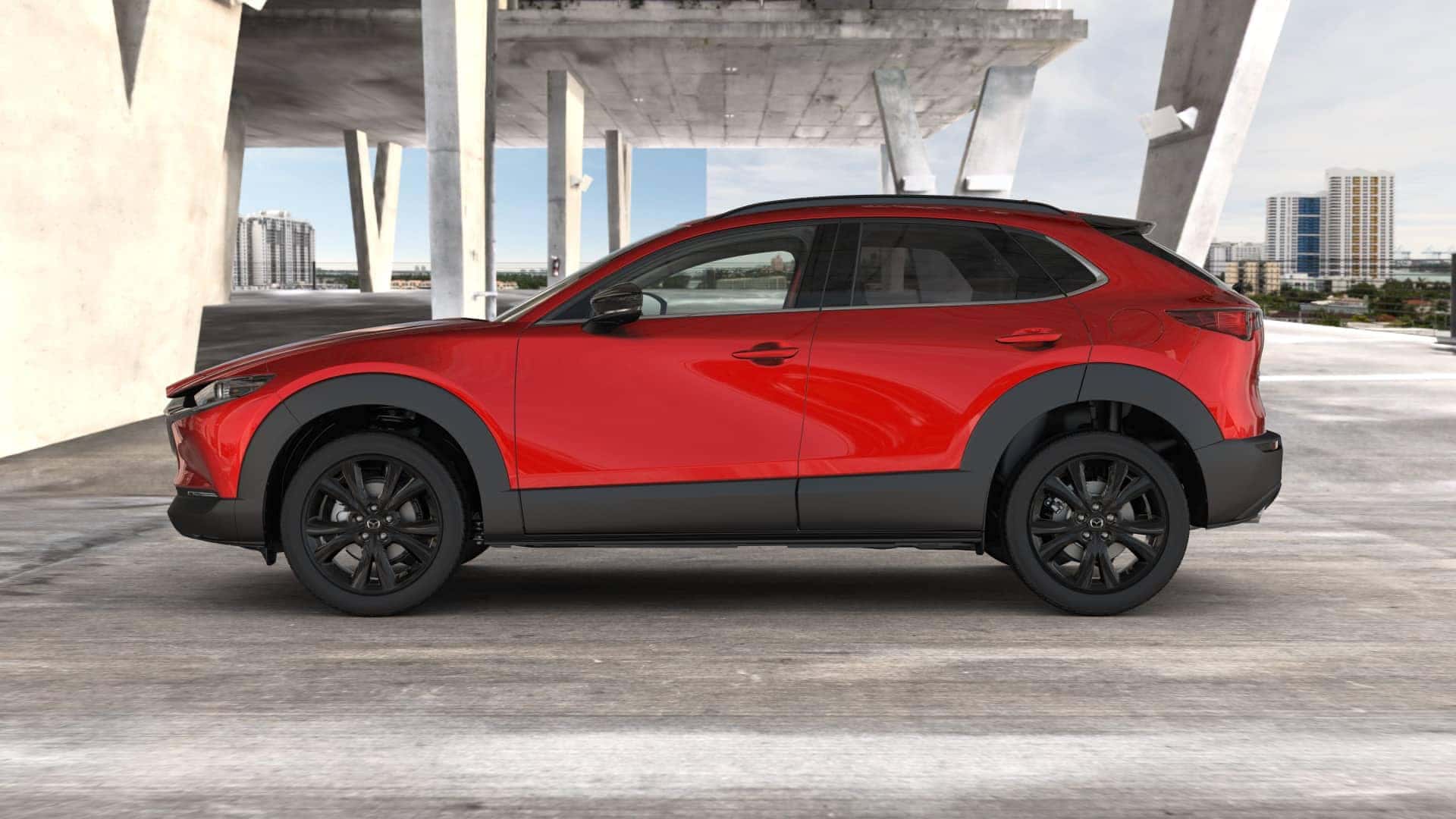 2025 Mazda CX-30 in Soul Red Crystal Metallic exterior at Kennesaw Mazda in Kennesaw, GA