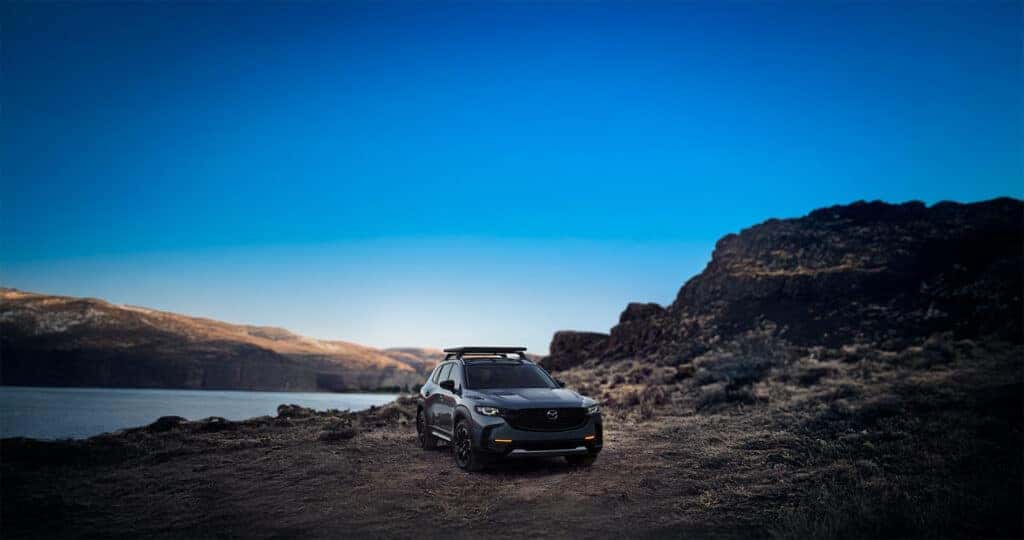 2025-Mazda-CX-50-parked-off-road-by-a-lake