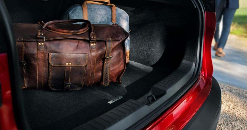 2025-mazda-cx-30-cargo-space-filled-with-weekend-travel-bags-in-the-trunk-space