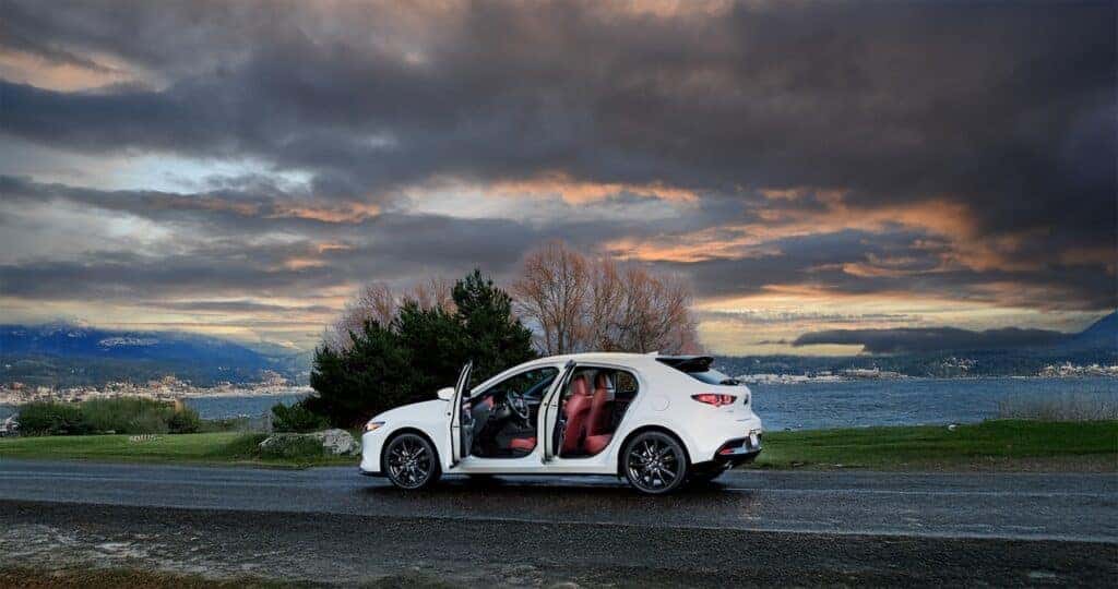 2025-mazda3-turbo-awd-rear-doors-open-to-show-red-leather-interior
