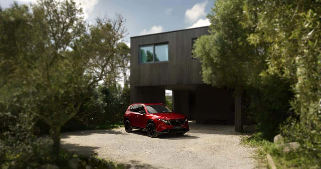 2026 Mazda CX-5 Redesign parked outside of a modern home
