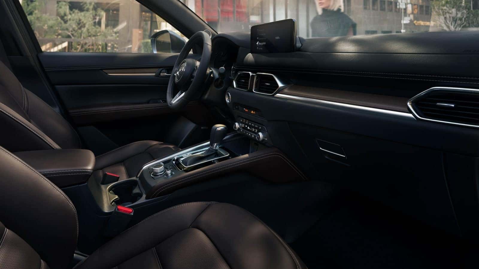 2026 Mazda CX-5 interior with black seating, center console & dashboard display