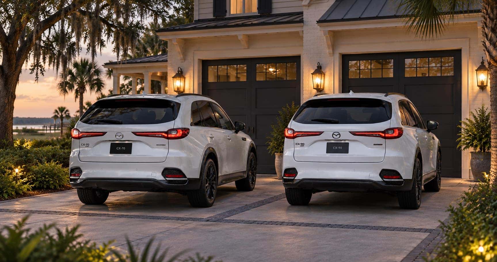 2026 Mazda CX-70 and 2026 Mazda CX-90 parked in a residential driveway in Savannah, GA