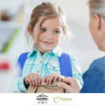 woman giving a child food for the weekend