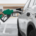 Stock image of someone fueling up a car