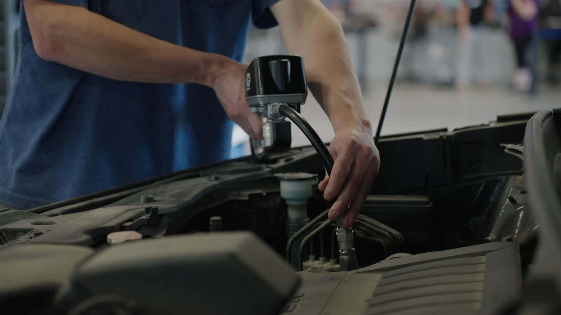 Technican working on a vehicle at the Kalispell Ford store in Flathead Valley