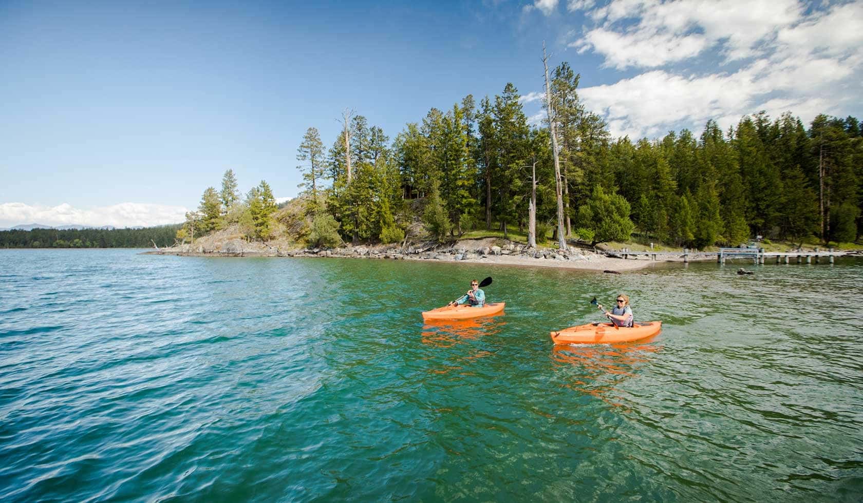 Two people kayaking on Flathead Lake in Northwest Montana