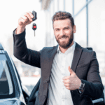 Man holding keys to his new Toyota