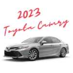 2023 Toyota Camry AWD in silver drivers side view with a white background