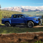 2024 Toyota Tacoma in front of mountains