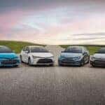 2022 Toyota Corolla Family Lineup shot during sunset on a long road in the backcountry