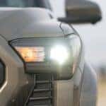Bronze 2024 Toyota Tacoma headlight up close
