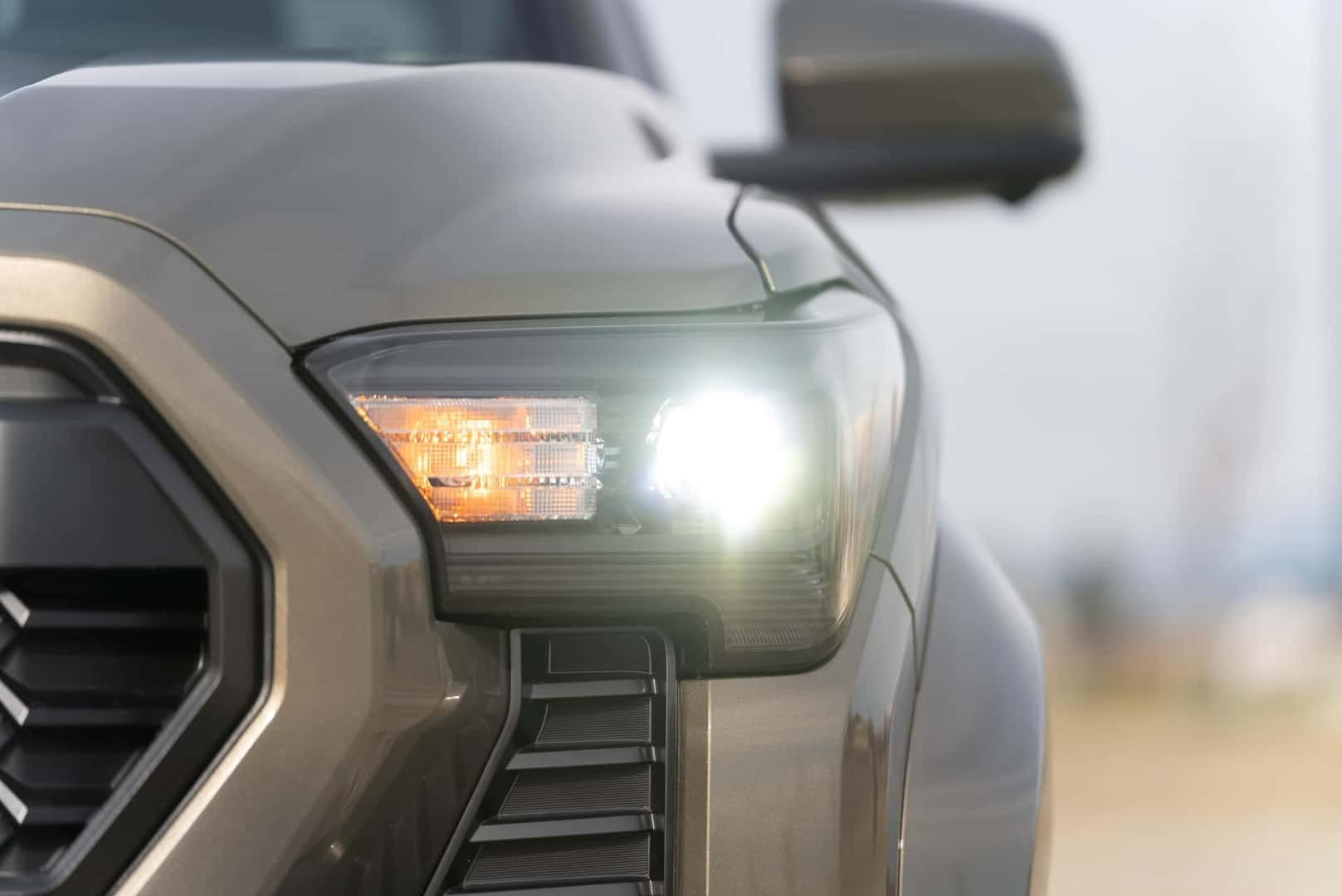 Bronze 2024 Toyota Tacoma headlight up close