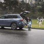 2024 Toyota Grand Highlander Hybrid picking up people from the park