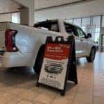 Raffle Sign next to a Toyota Tundra in our Kalispell Toyota showroom