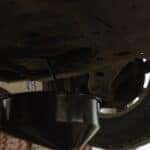 Toyota Certified technican changing out the oil in a vehicle at Kalispell Toyota