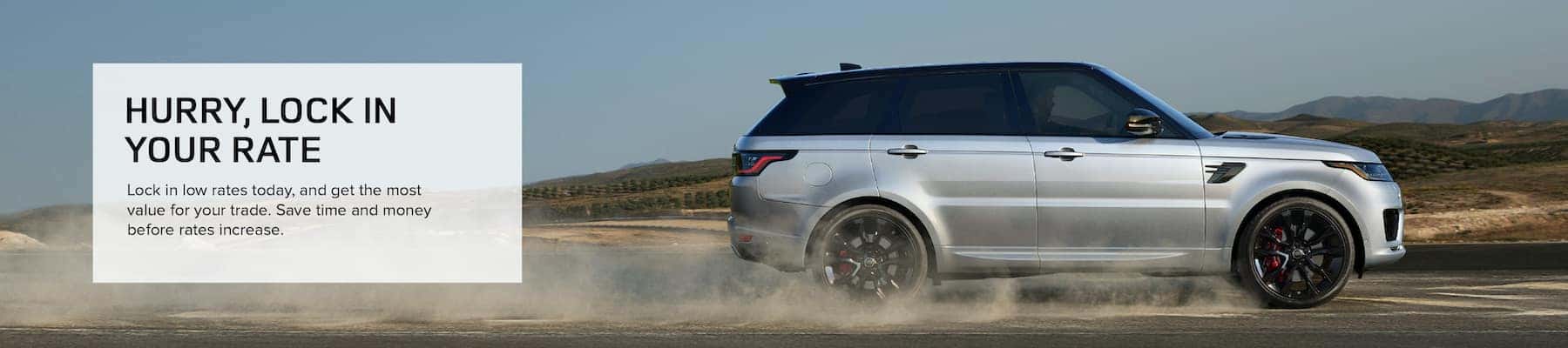 Text says: 'Hurry Lock in your rate' and a Silver Land Rover drives on the desert.