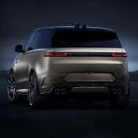Dark background with a grey landrover on it. Text reads 'All the models of LAND ROVER and their towing capabilities'