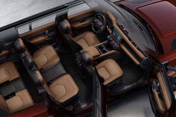 LDefender 110 interior overhead view showing three-row cognac leather seating
