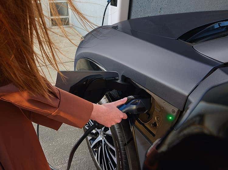 Lexus RZV Plugging in to Charge