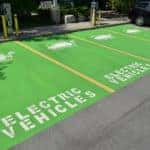 Electric vehicle specific parking spaces with available chargers.