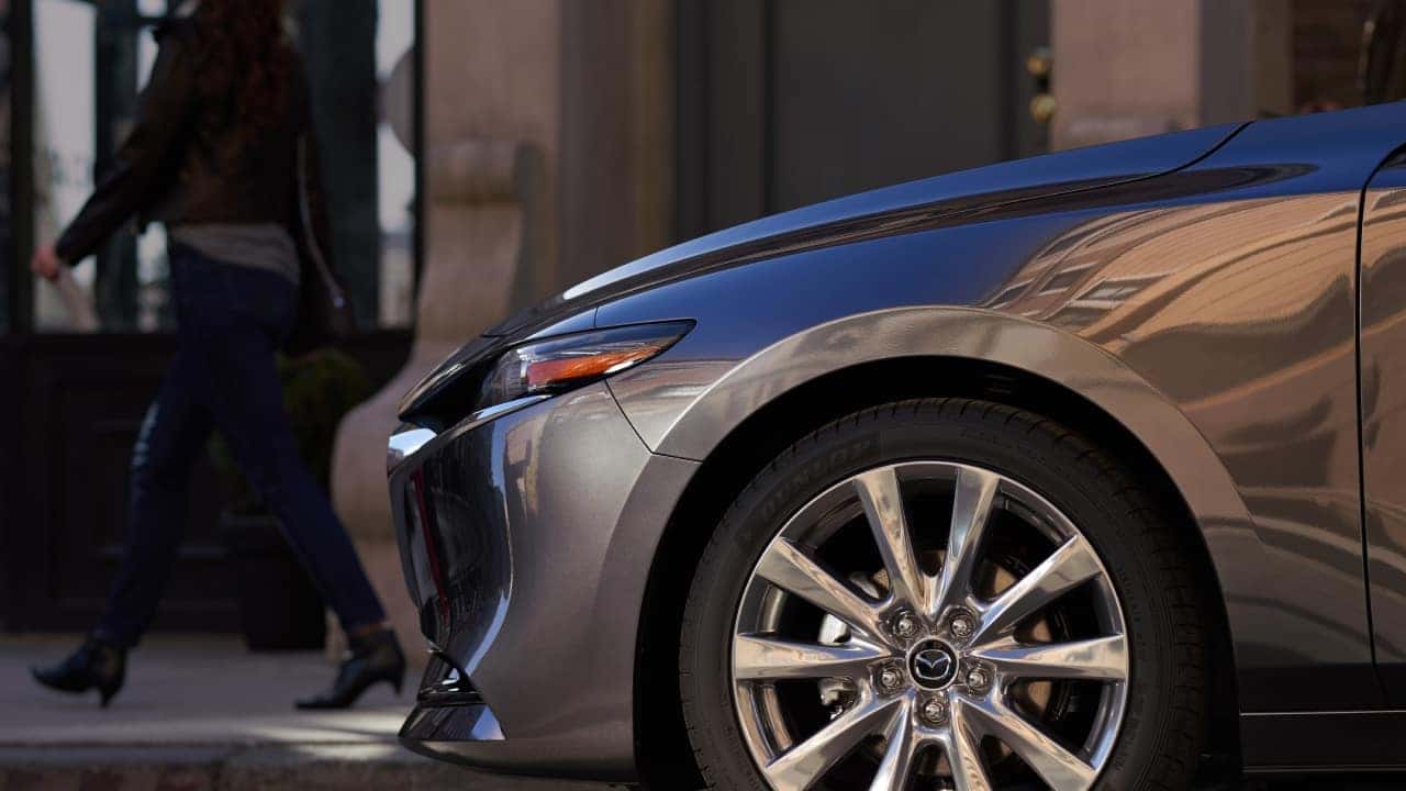 Mazda3 Sedan driving on a winding road demonstrating agility