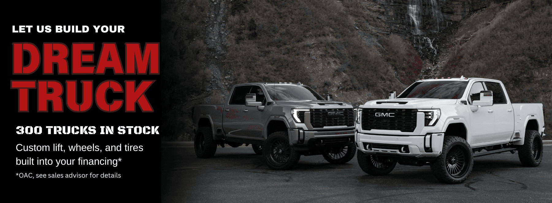 a grey and white truck in front of a mountain