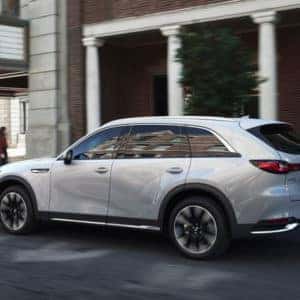 2024 Mazda CX-90 rear driver side view parked