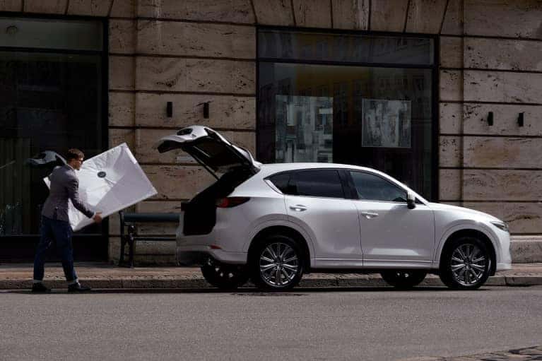 2022 Mazda CX-5 Crossover SUV-sideview-parked-trunk-open-painting-white-mobile