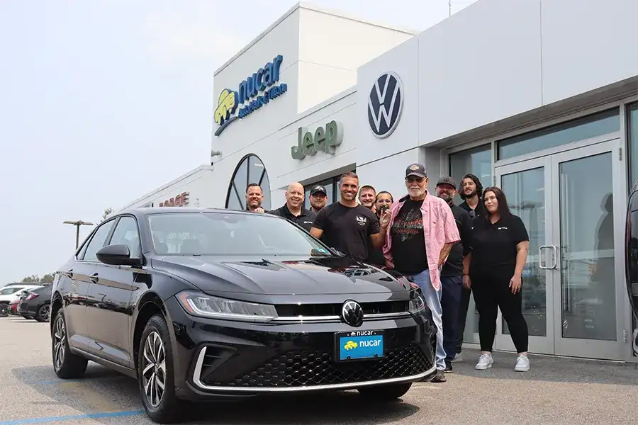 2025 Nucar VW Jetta Winner and Tilton VW Staff
