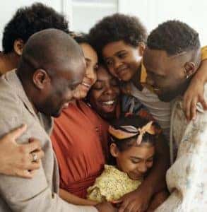 A big family hugging each other when purchased an SUV in Mississauga, Brampton