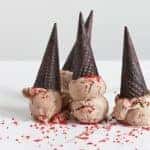 Four Ice Cream Cones upside down on a white table with a white background