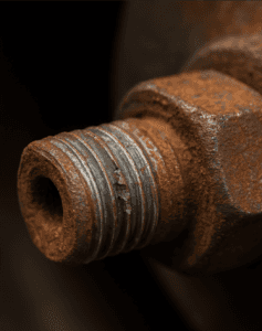 Damaged and rusted lug nut
