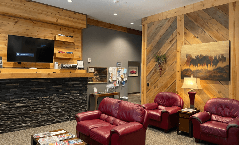 Customer Waiting Area with Sofas and TV