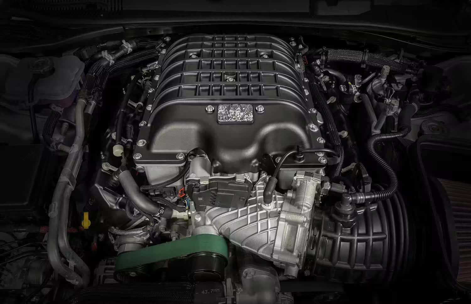 Close-up of a powerful Hellcat V8 engine, symbolizing its return