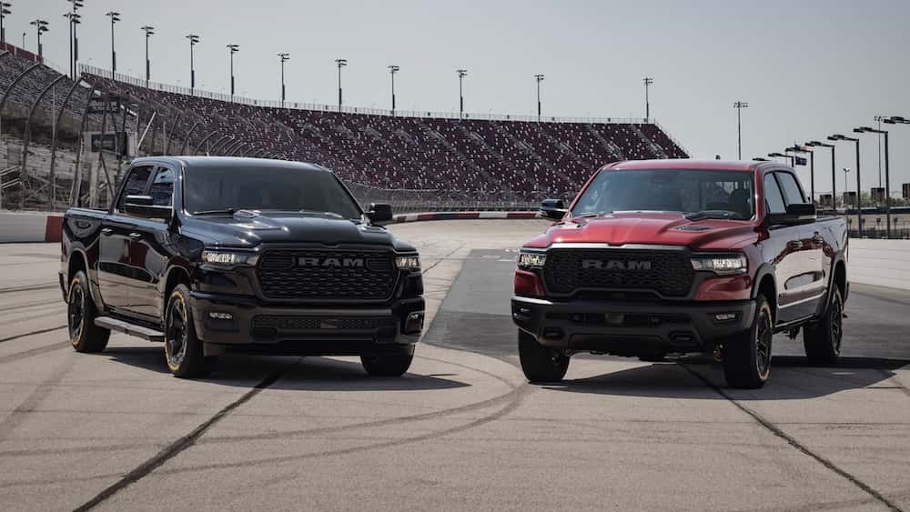 Lineup of 2026 Ram 1500 trims parked side by side