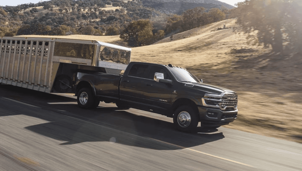 2025 RAM 3500 towing a horse trailer