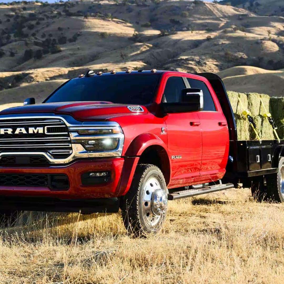 RAM 3500 with flatbed hauling hay