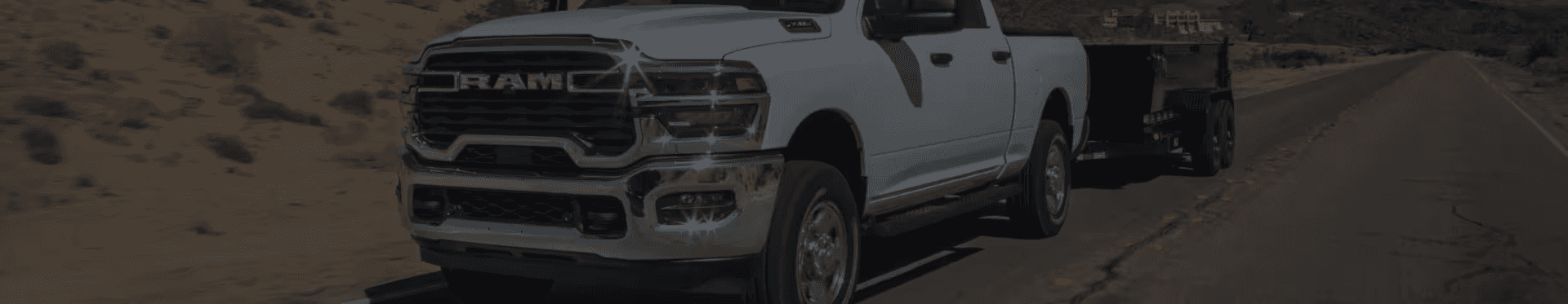 RAM pickup truck pulling a trailer