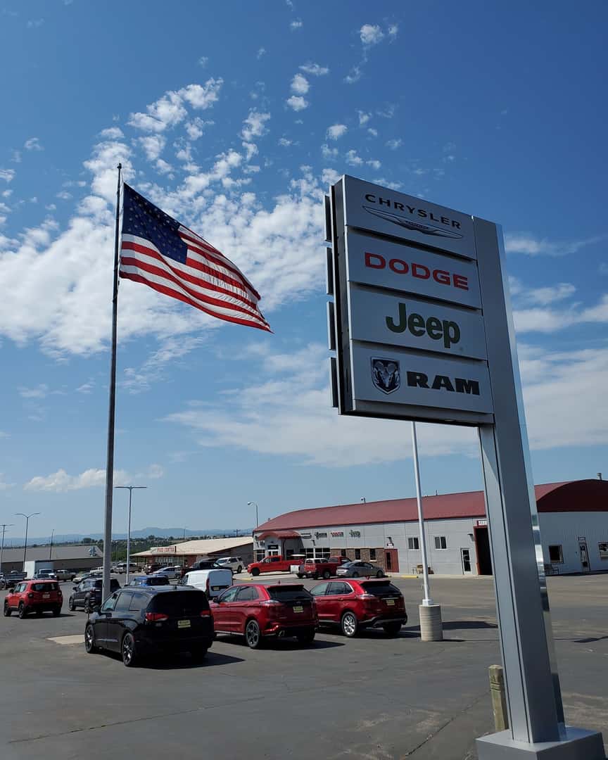 American flag in Chrysler Dodge Jeep RAM dealer lot