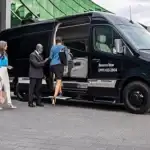 2025-Sprinter-Passenger-Van-Loading-Guests