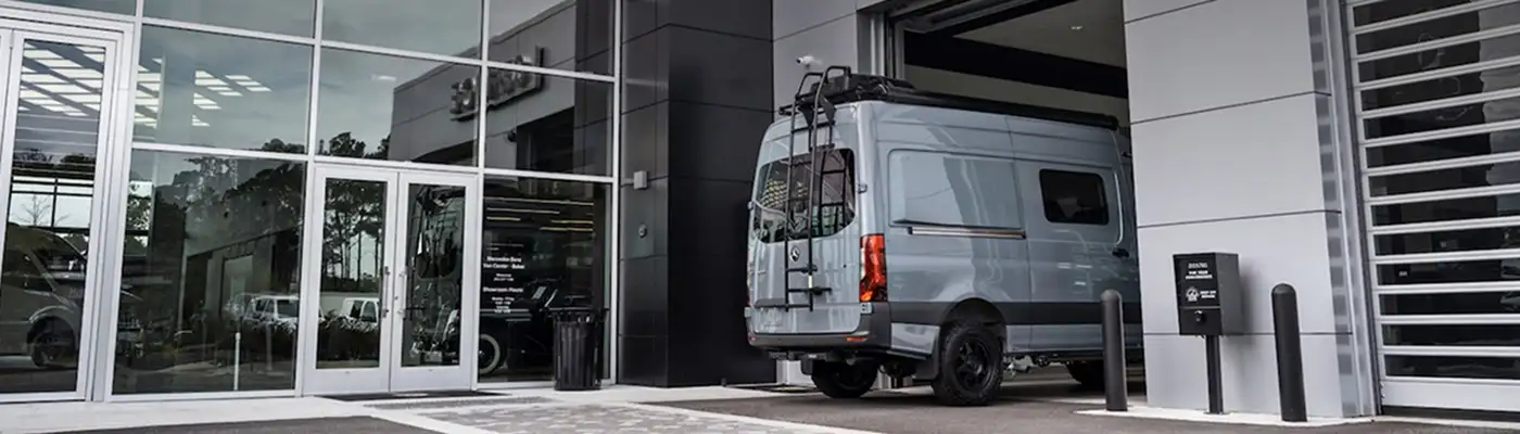 Mercedes-Benz Sprinter Van Pulling Into Service Drive