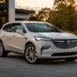 Modern SUV by sunset in luxurious setting
