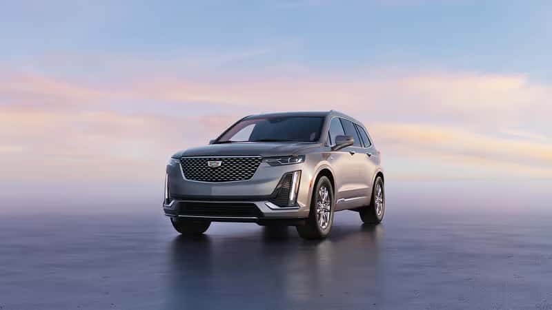 2026 Cadillac XT6 luxury SUV displayed on open road at Stephen Wade Cadillac dealership serving St. George, UT