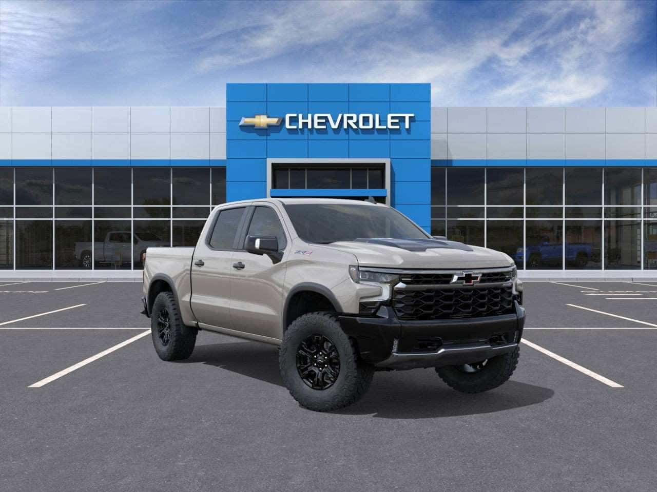 Front three-quarter view of a 2026 Chevy Silverado 1500 parked outside a Chevrolet dealership in St. George, UT