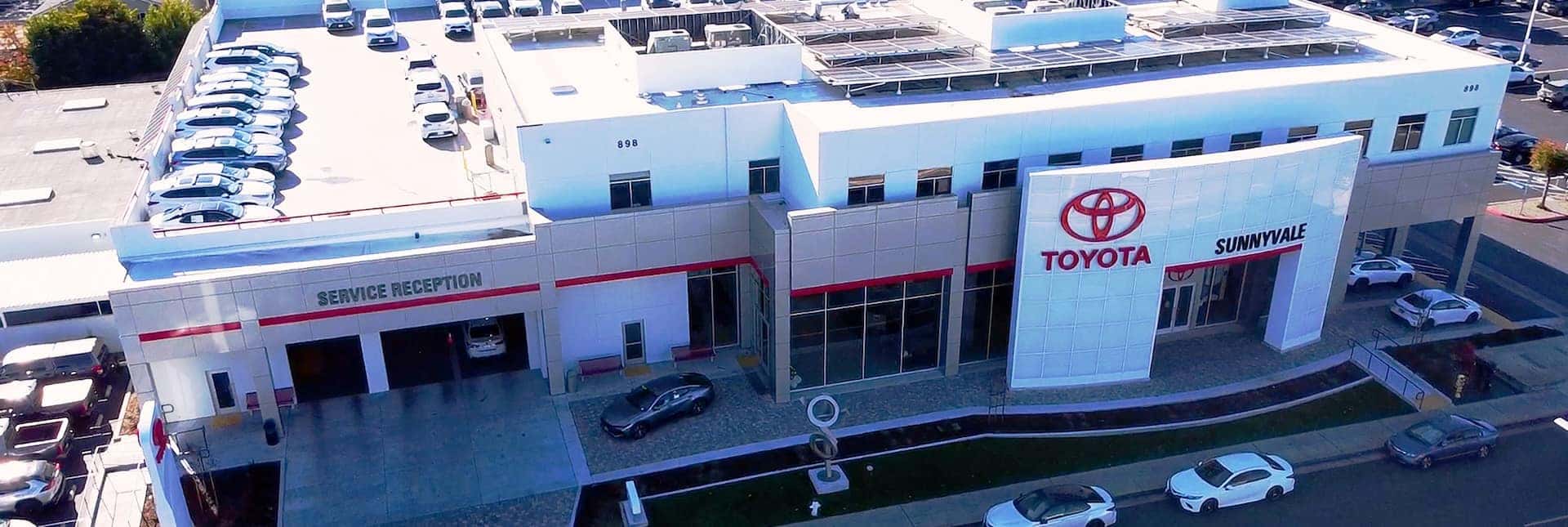 Birds eye view looking down on dealership entrance